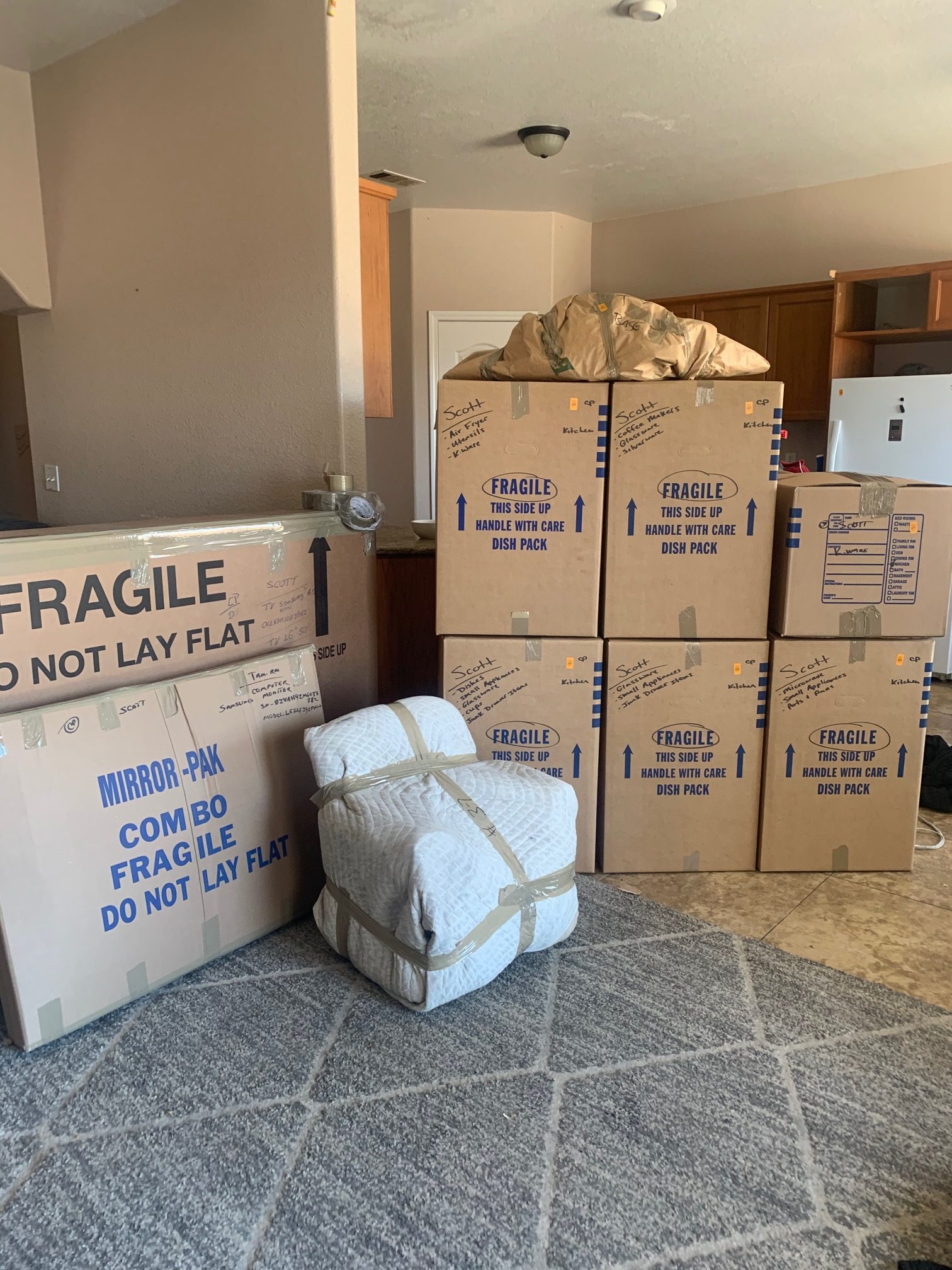 room full of moving boxes